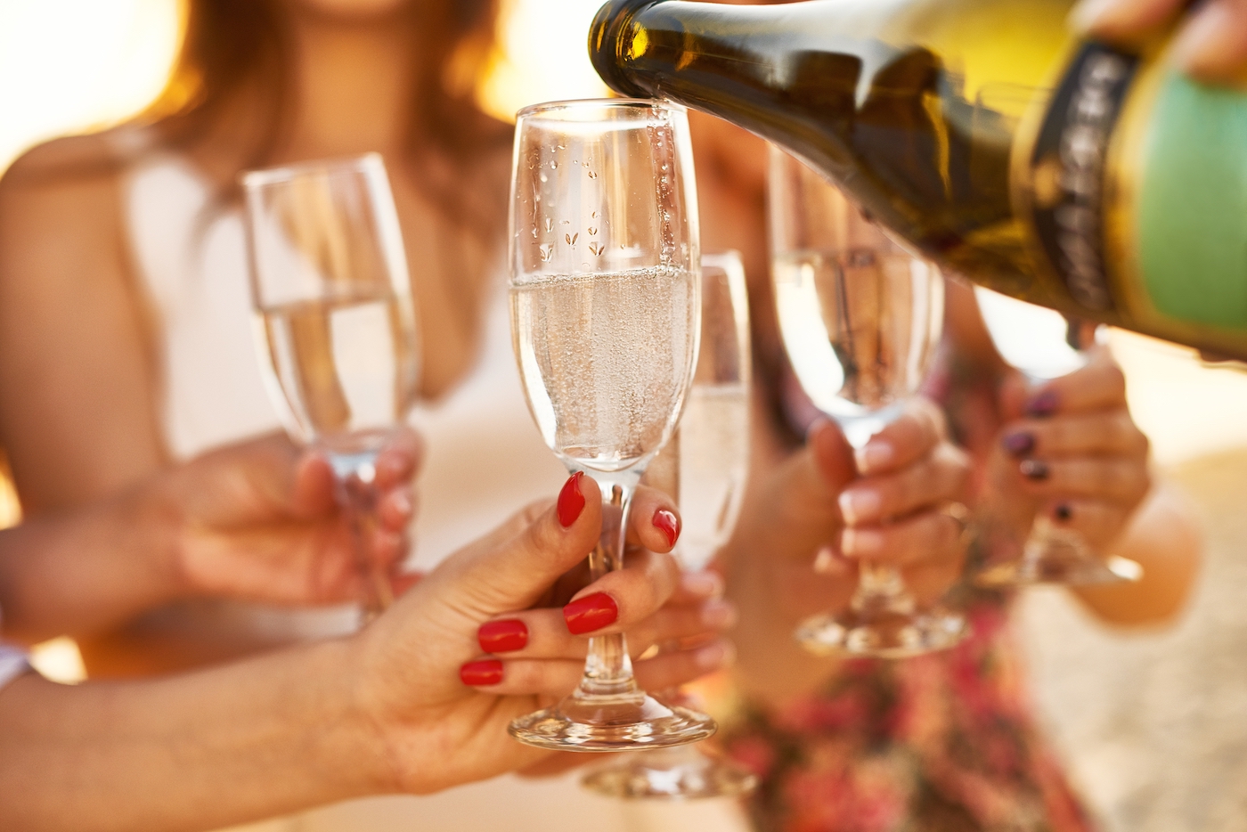 women-drinking-champagne-at-bachelorette-party-on-2023-11-27-05-33-00-utc